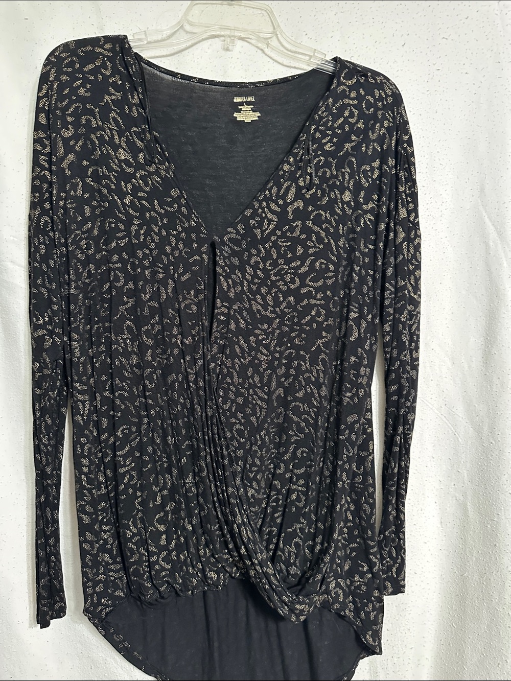 Jennifer Lopez Long-Sleeve V-Neck Twist Front Top in Black with Metallic Print
